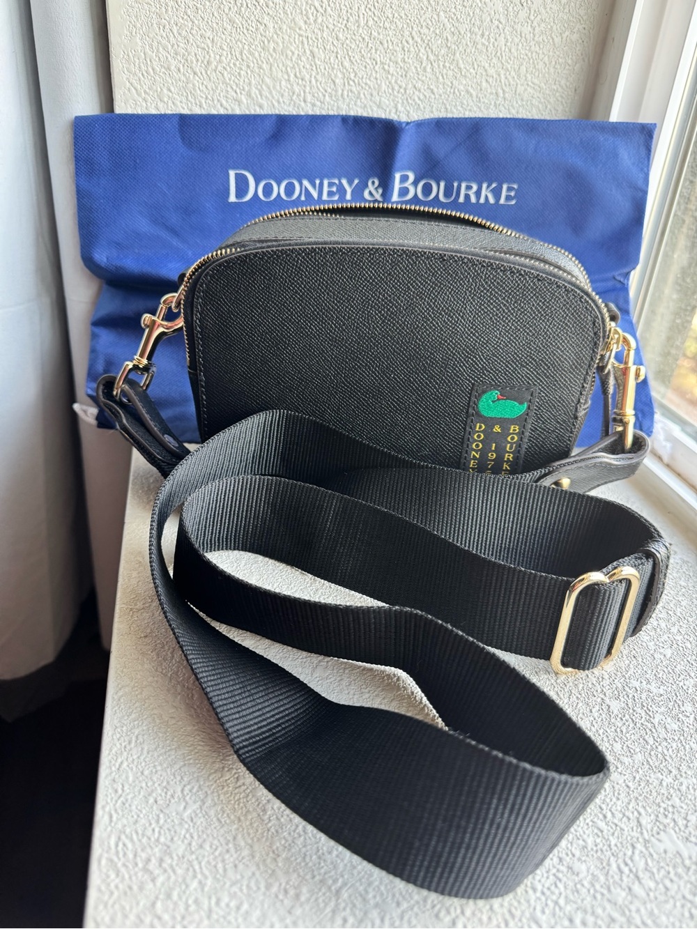 Dooney & Bourke Black Alpine Ambler 20 Crossbody Bag with Gold Hardware